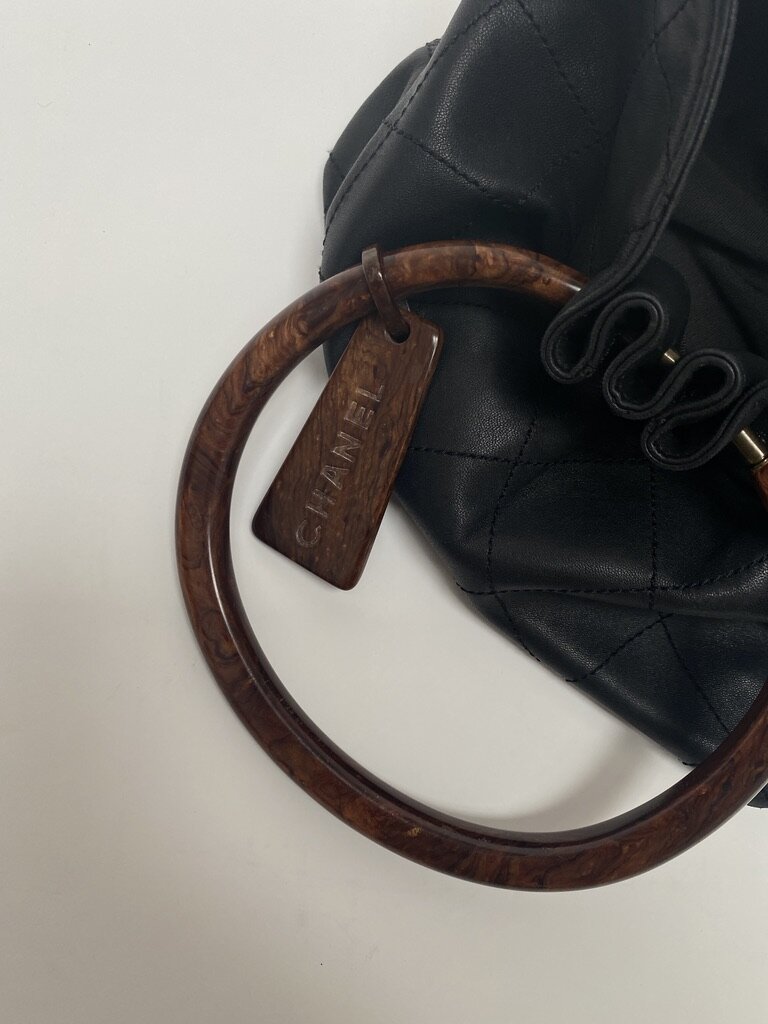 Black Chanel Leather Bag with Leather Logo — Harriett's Closet