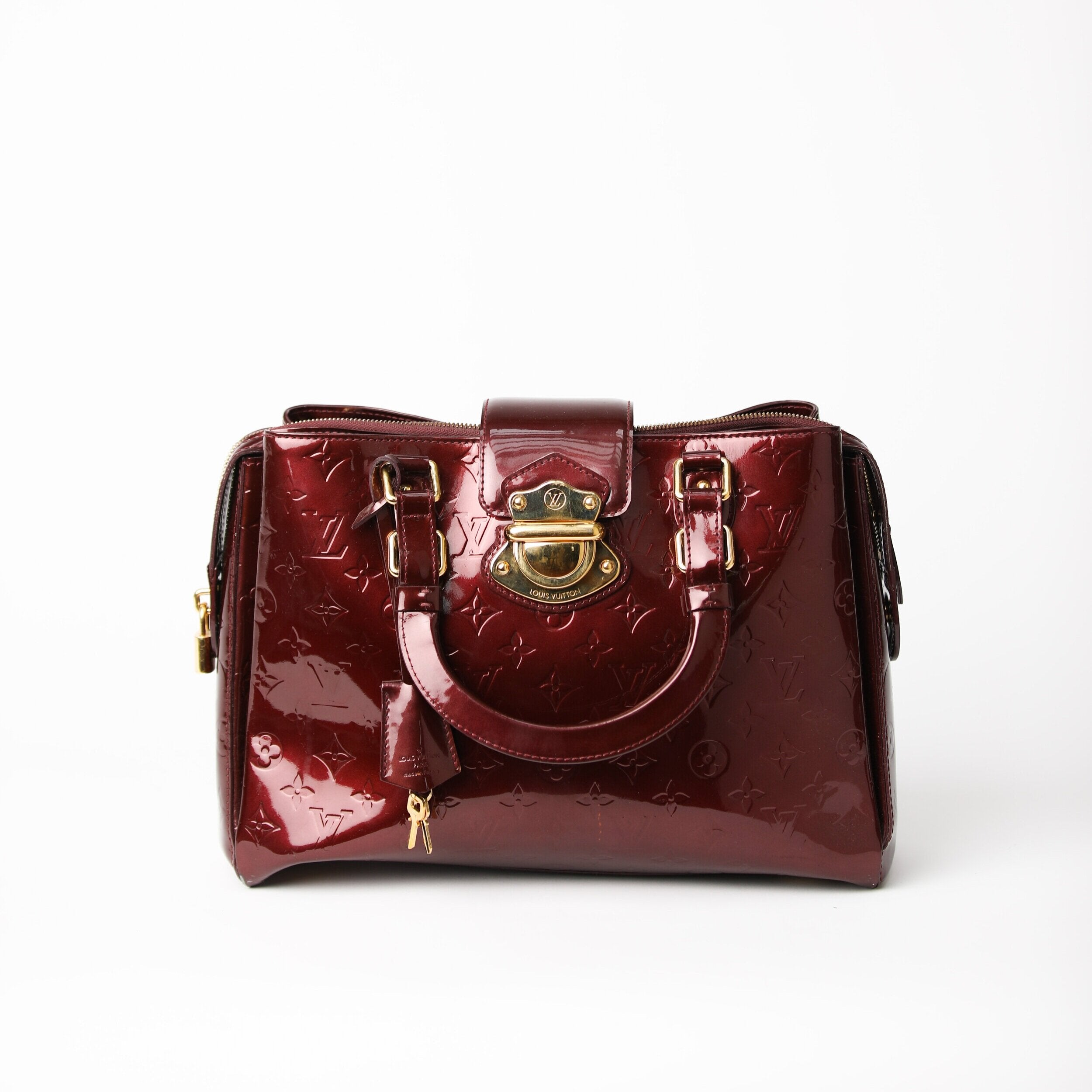 LOUIS VUITTON  Plum Patent Leather Top Handle with Matching Wallet – The  Vault By Volpe Beringer