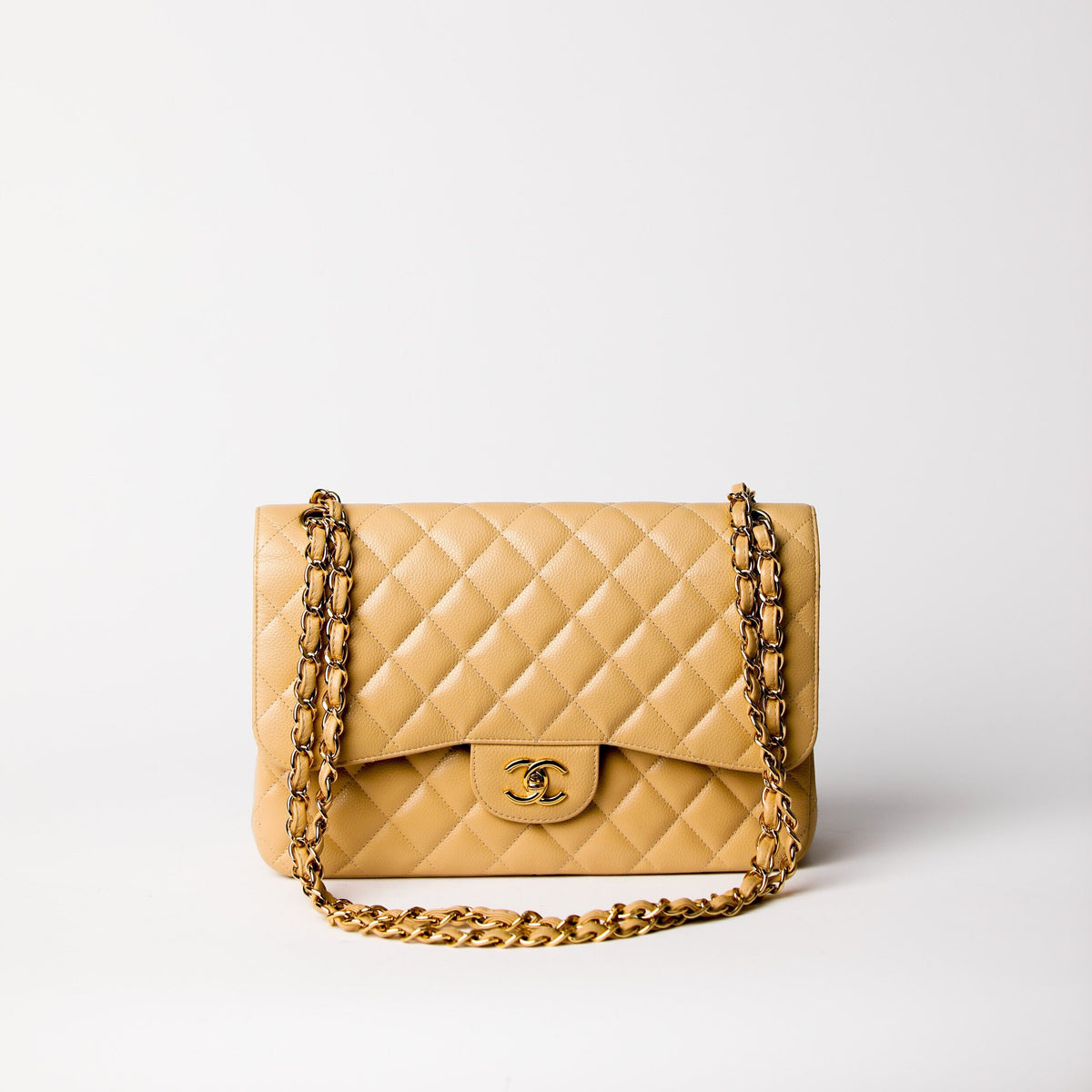 CHANEL | Tan Classic Double Flap Bag Quilted Caviar Jumbo